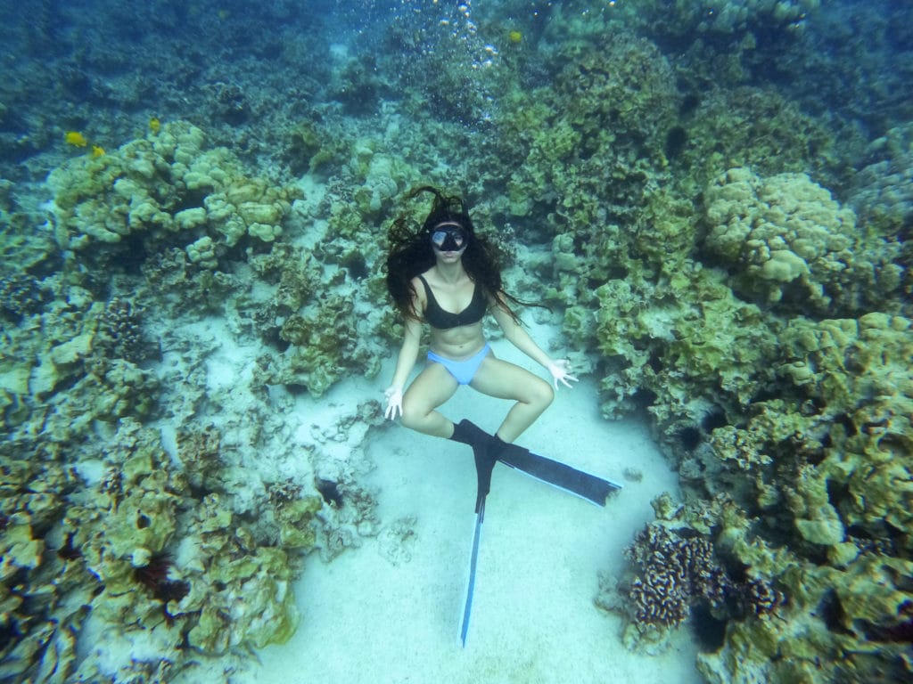 woman snorkeling underwater