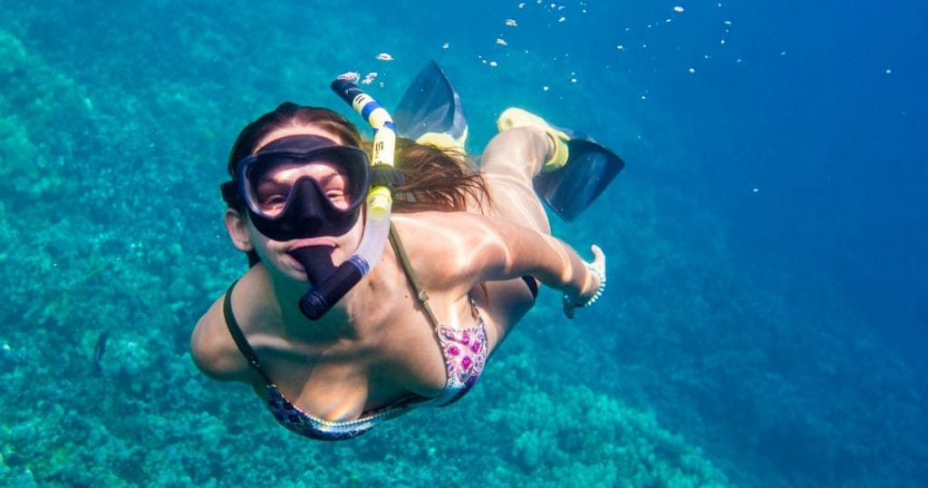 woman-snorkeling-sea-paradise-kona-big-island